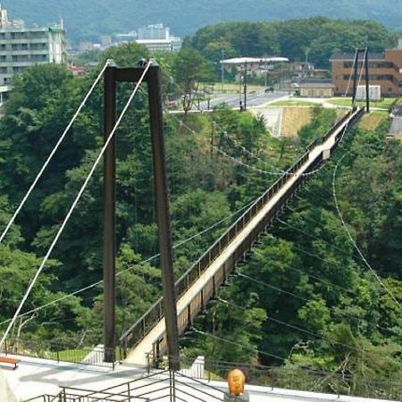 Отель Kinugawa Onsen Sanraku Никко Экстерьер фото